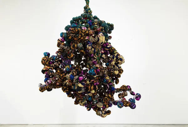 Samuel Nnorom, Attachment, 2024, African print fabric, 120 × 180 × 70 cm