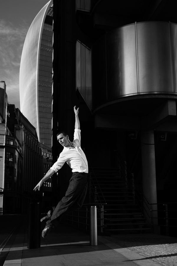 Movement study - Dancing 1. Dancer Jonathan Goddard. At the Lloyds building, London, UK. Prints of dancers. By movement photographer Simon Tomkinson.