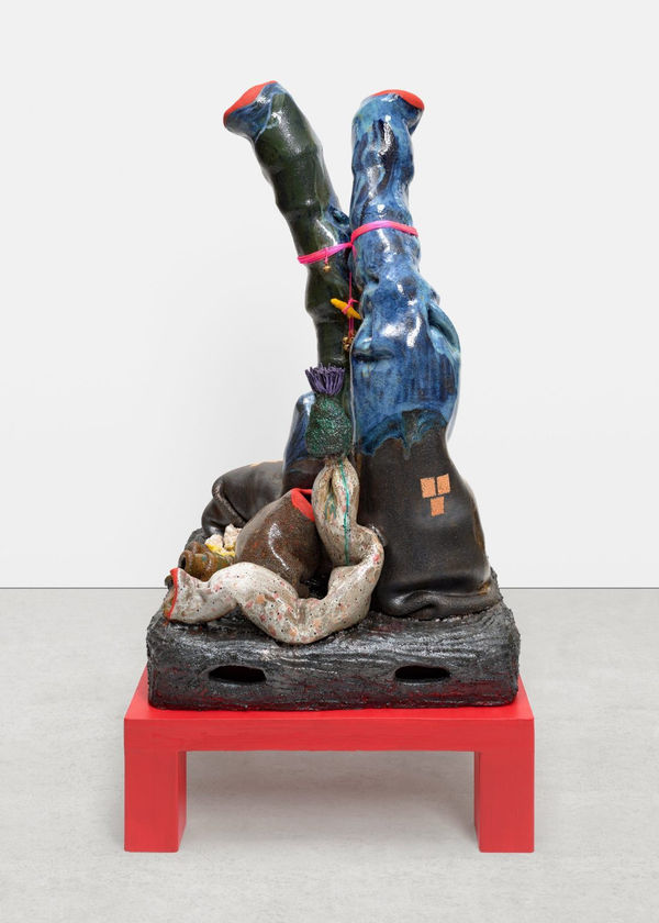 Lovers on the Earthquake Trail (Assembling California), 2023. Glazed ceramic sculpture on a wooden base, 52 x 30 x 30 inches