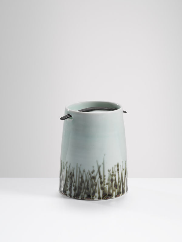 Chris Keenan, 36. Celadon caddy with reddish reeds and (4000-year-old) bog oak fastening