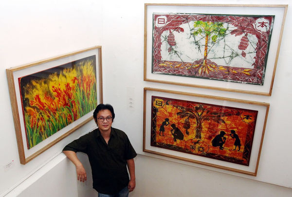 In this solo exhibition, Chang explores the history of cash crop plantations in this country through unconventional batik motifs. Photo: The Star/Azlina Abdullah