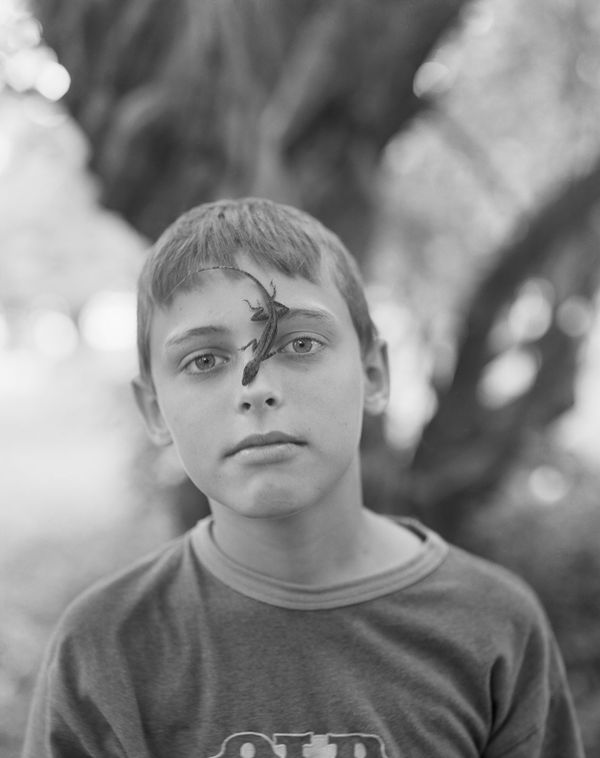 Jonathan with Pet Lizard, Brighton Farm, St. George, Barbados, 2006 Selenium Toned Silver Gelatin Print, 24x20" Archival Pigment Print on Moab Entrada Rag, 21x17" Edition of Three