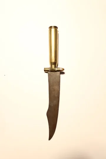 Letter Opener (bullet casings), 2015 C-print 14 x 11 inches