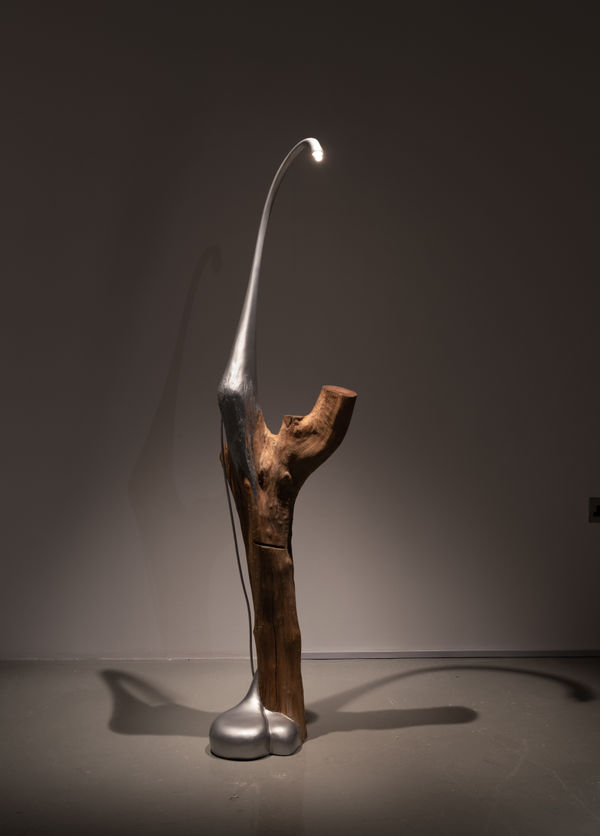 Nada Elkharashi Two, 2025 Existing tree log,Digital fabrication,Silver leaf 170 x 40 x 40 cm