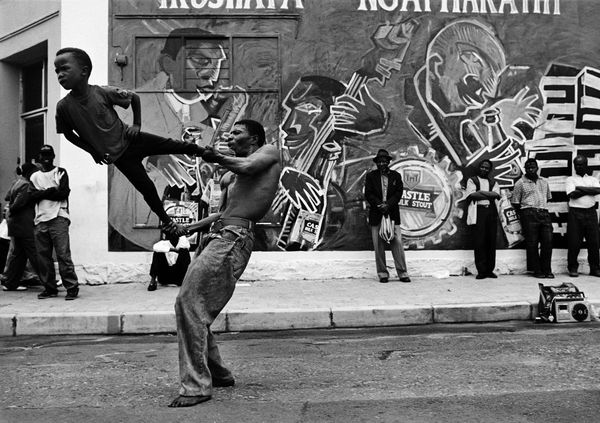 Jodi Bieber, Father and son trapeze act, Market Theatre Precinct, Newtown, c.2012