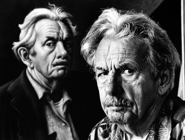 Alfred Eisenstaedt, American artist Thomas Hart Benton posing next to self-portrait. Martha's Vineyard, MA, 1970