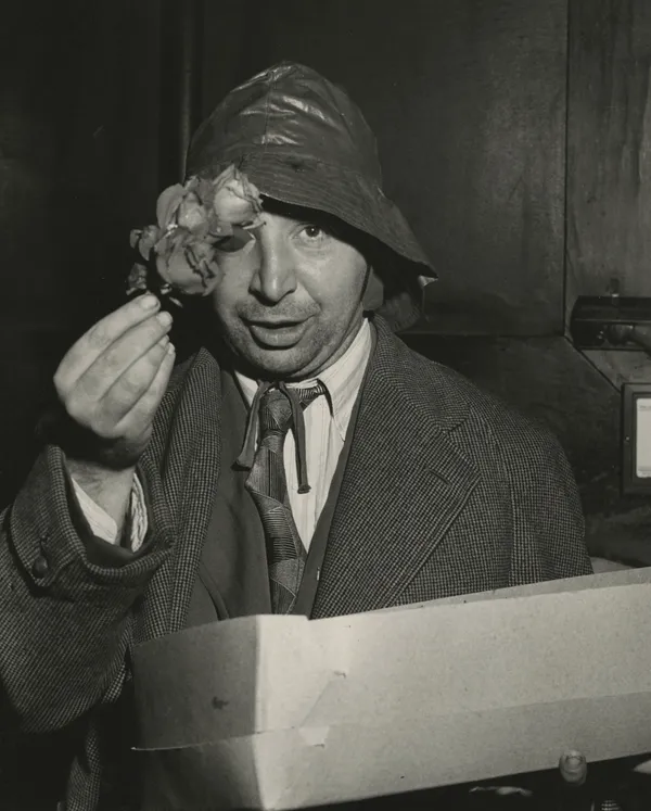Weegee, The Flower Peddler near the Old Metropolitan Opera House, 1941