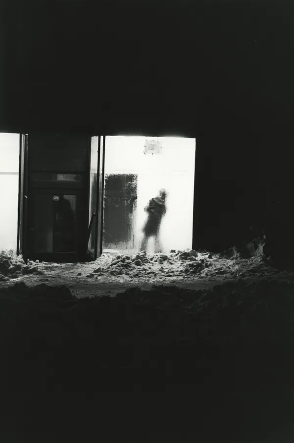 Larry Siegel, Man Passing Dorway, Snow, New York, 1956