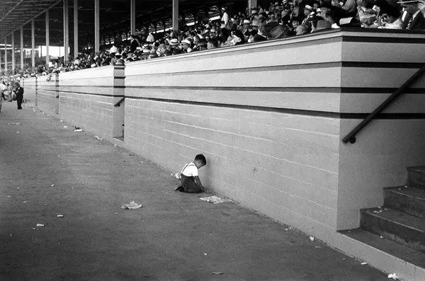 Tosh Matsumoto, Untitled (little boy in stadium), c.1950