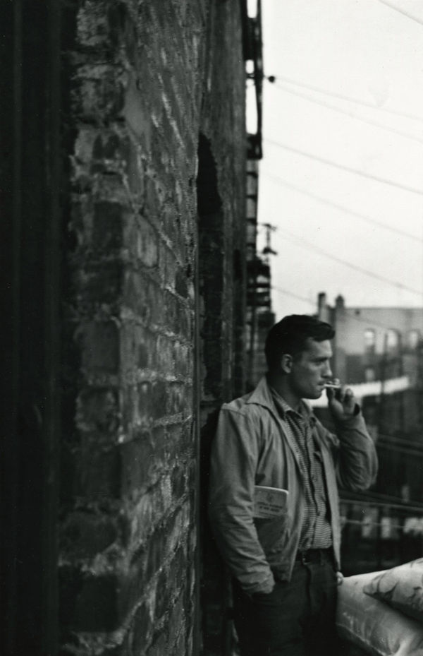 Allen Ginsberg, Heroic portrait of Jack Kerouac with R.R Brakeman's manual in pocket, fire-esape 206 E. 7th Street, NY, 16-Dec-86