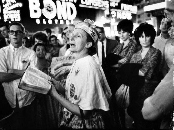 Garry Winogrand, Street corner evangelist "Rosie" preaching at Broadway & 45th Street, New York City, 1966