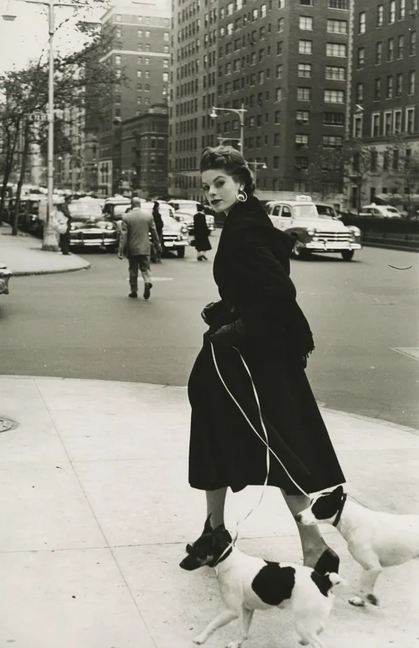 Frances McLaughlin-Gill, Model Walking Two Jack Russel Terriers, NYC, 1953