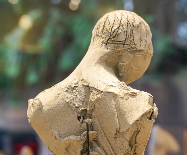 Ceramic sculpture studio female figurative work in progress