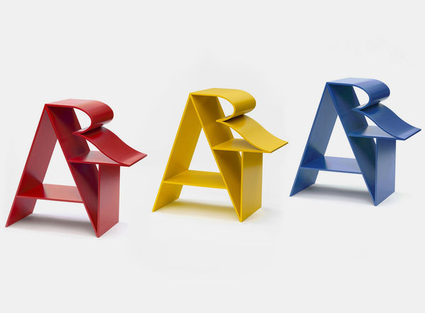 Three sculptures by Robert Indiana in Red, Yellow and Blue of the word ART