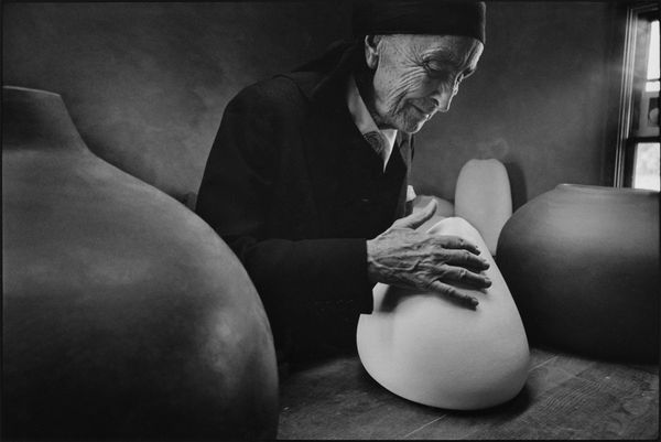 Dan Budnik (1933-2020) "Georgia O’Keeffe at the Ghost Ranch with pots by Juan Hamilton, New Mexico, March, 1975"