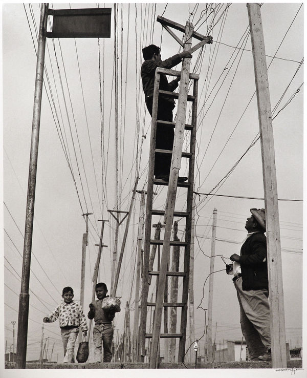 Rodrigo Moya (1934-2025) "Luz robada, Ciudad Netzahualcóyotl, México," 1962 gelatin silver print