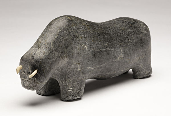 Lot 98 WILLIAM ANAUTALIK (1931-1987), QAMANI' TUAQ (BAKER LAKE) Muskox, early 1985 stone and antler, 3.25 x 7.5 x 2.5 in (8.3 x 19.1 x 6.3 cm) Estimate: $1,200⁠⁠⁠— $1,800 price realized: $1,200