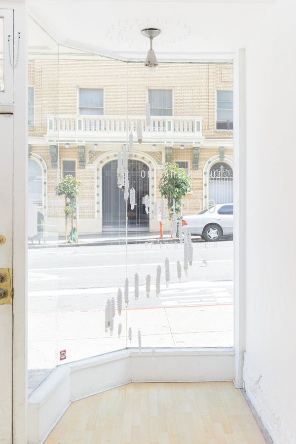 Installation view of Lucien Shapiro's solo show "Oculus", featuring found-object ritual sculptures