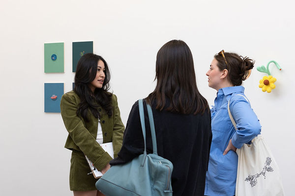 Director Jennifer Rizzo talking with two others