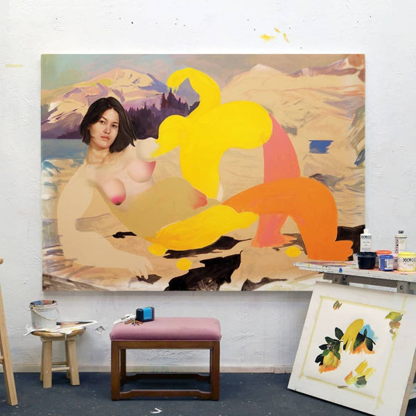 Erik Jones painting in progress in the studio, featuring bright colors and abstracted nude woman