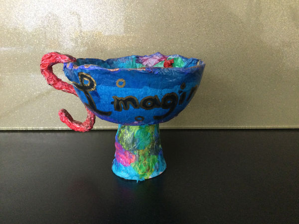 Rose-Erin Dhond, aged 12. Inspired by Montreux 1983 and Alice in Wonderland.