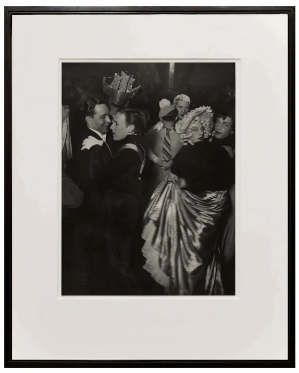 framed photograph of men dancing together at a ball from Paris de Nuit by Brassai