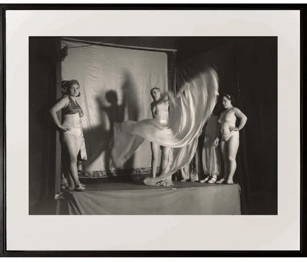group of women on stage at the Fete Foraine from Paris de Nuit by Brassai