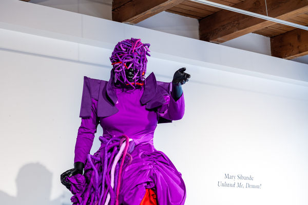 Mary Sibande Ascension of the Purple Figure, 2016 Fiberglass, resin, fabric, and steel on painted wood plinth 111 3/4 x 39 3/4 x 39 3/4 in 284 x 101 x 101 cm