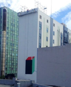 Photo of Rojas’ mural on one side of the Warfield building. Photo from the San Francisco Arts Commission Facebook page.