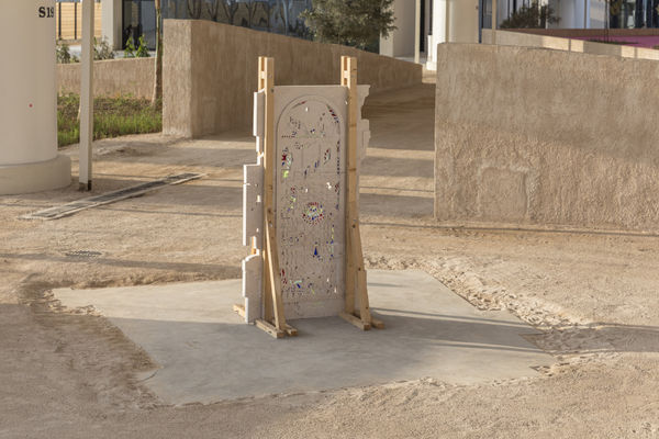 Maintaining the Sacred, 2023. Hand-carved plaster with inset colored glass pieces.