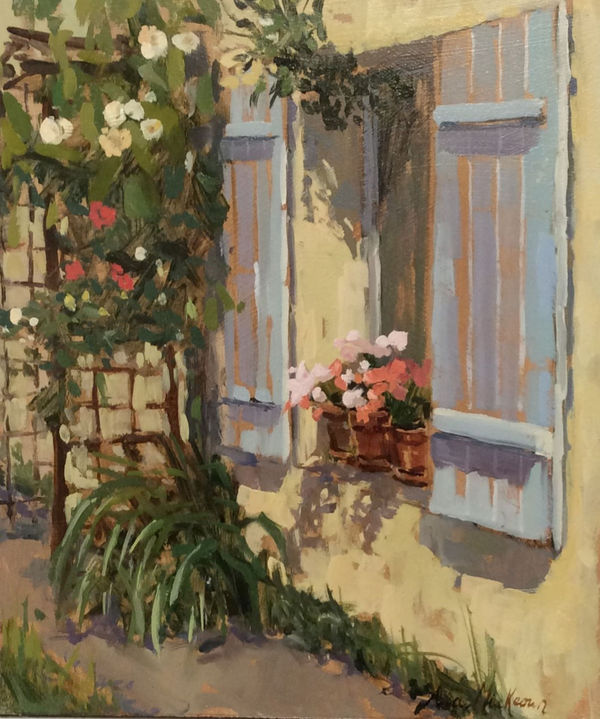 Cottage windows bathed in sunshine