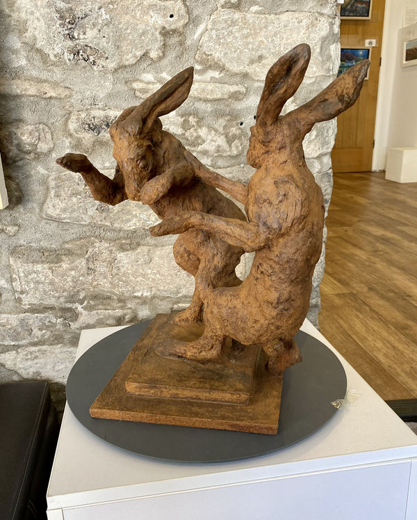 Boxing hares sculpture