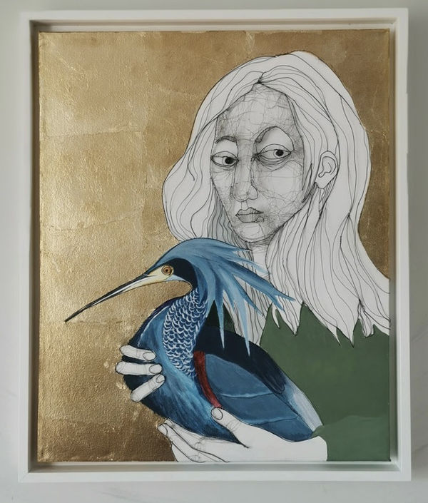 Girl with a blue heron