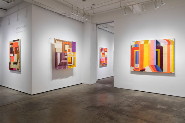 Installation shot of four pieces of art by Deborah Zlotsky. From left to right, they are "Lady Marmalade", "For sure 100%", "Detours and delays" and "I could drink a case of you". "For sure 100%" is made from vintage scarves. The rest are oil on canvas.
