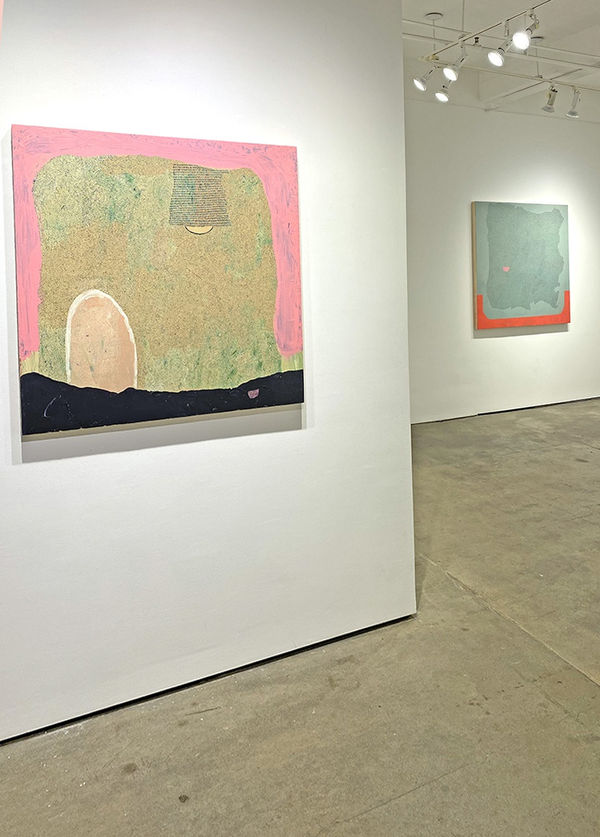 installation shot of two paintings by Maeve D'Arcy