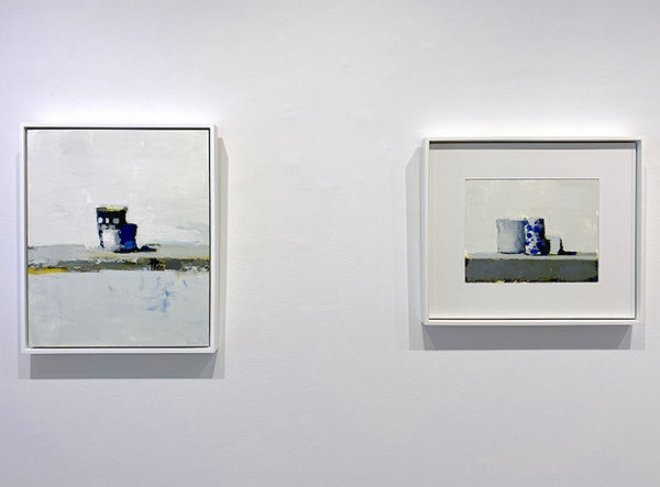 Two of Stanley Bielen's works hung up on the gallery wall 