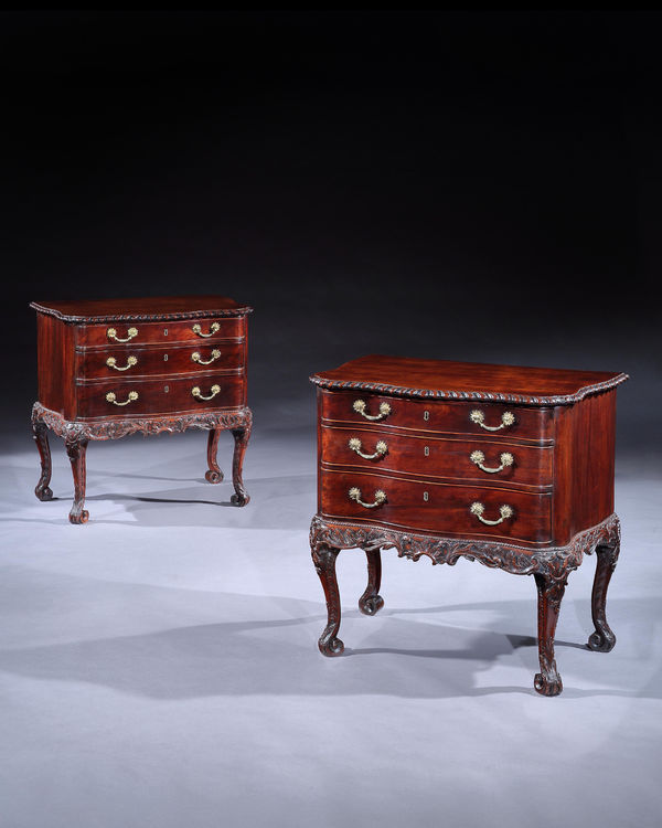 A PAIR OF GEORGE II MAHOGANY COMMODE CHESTS , English, circa 1755