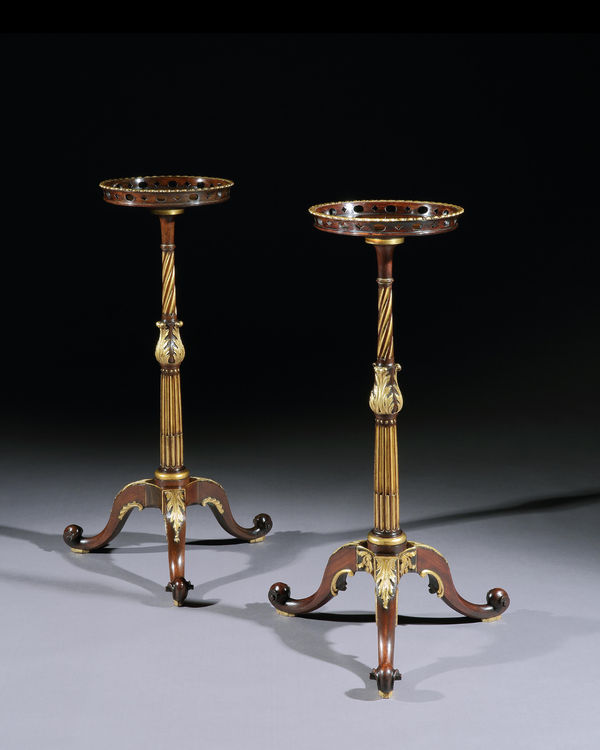 A NEAR PAIR OF GEORGE II PARCEL GILT TORCHÈRES, English, circa 1750