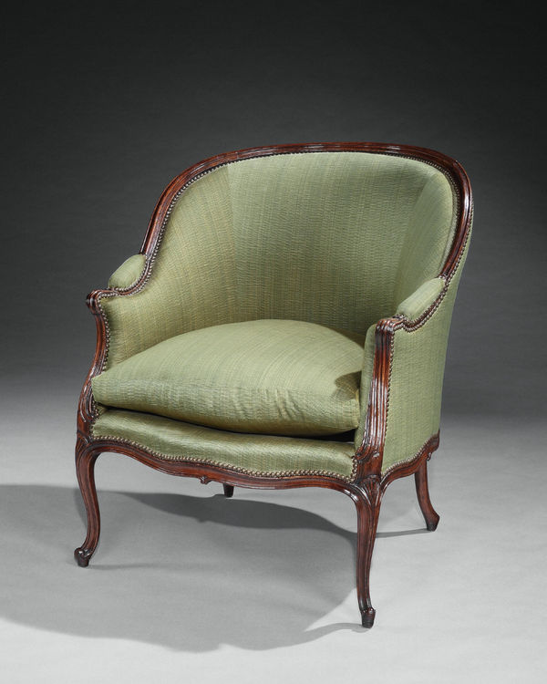 A HUGE GEORGE III MAHOGANY BERGERE CHAIR