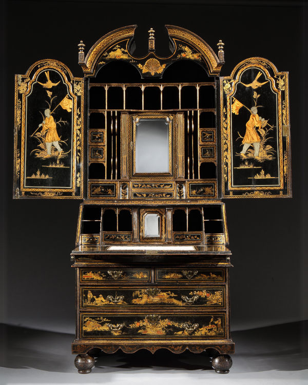 A QUEEN ANNE BLACK JAPANNED BUREAU CABINET, English, circa 1710