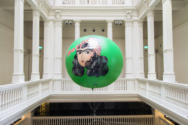 Image of Slavs and Tatars installation view of green spherical sculpture