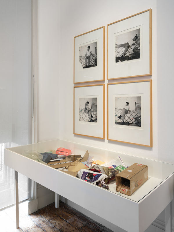 Above: John Deakin photographs of Lucien Freud (1965) Below: Vitrine by Jeremy Deller (2022)