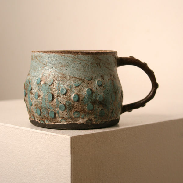 Elly Wall stoneware ceramic mug with raised bumped texture and turquoise glaze