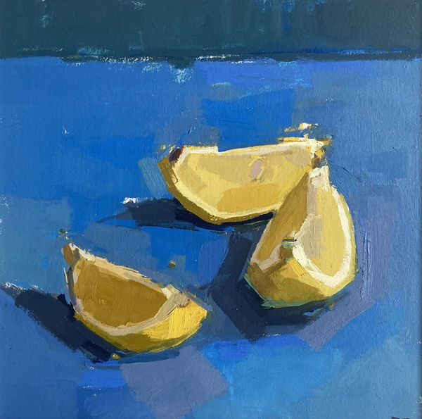 Sarah Spackman still life painting painted in figurative brush strokes of 3 slices of lemon, places nonchalantly with the peel side down. The surface is painted in tones of cornflower blues, contrasting with the yellow of the lemons.
