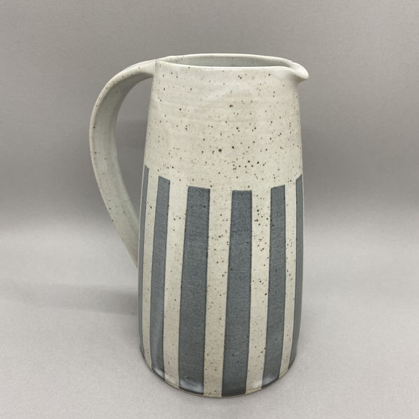 Kate Garwood white jug in a straight shape with wide blue stripes.