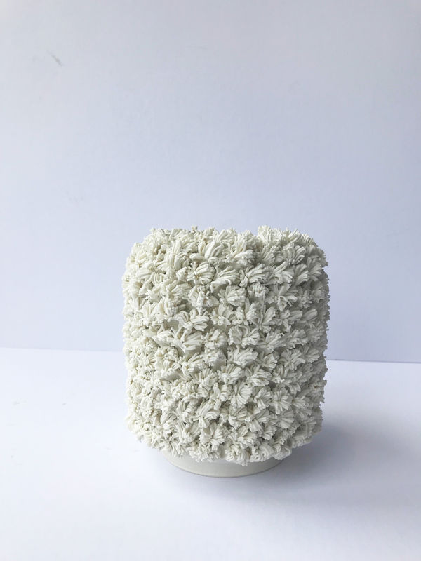 Emma Jagare hand built porcelain white vase showing dimensional detail of coral.