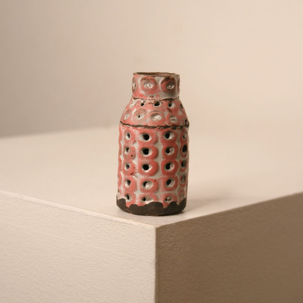 Elly Wall stoneware small ceramic bottle vase with raised bumpy texture pink glaze