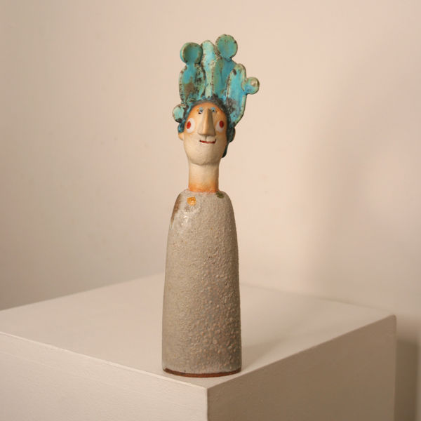 Jane Muir minimalist sculpture of a man, with a cactus tree on his head