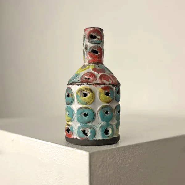 Elly Wall ceramic bottle vase with circular raised patterns in rainbow colours