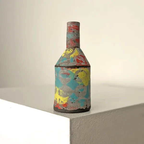 Elly Wall ceramic bottle vase with circular patterns in rainbow colours